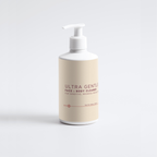 Ultra Gentle Face & Body Cleanser bottle on a light gray background